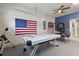 Game room with air hockey and American flag at 1627 Lima Ave, Kissimmee, FL 34747