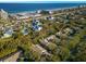 Aerial view of community near beach, pool, and tennis courts at 4407 Sea Mist Ct # 267, New Smyrna Beach, FL 32169