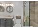 Bathroom with a walk-in shower, updated vanity, and toilet at 4407 Sea Mist Ct # 267, New Smyrna Beach, FL 32169