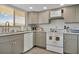 Updated kitchen with granite countertops and modern appliances at 4407 Sea Mist Ct # 267, New Smyrna Beach, FL 32169