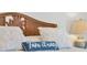 Close-up of bed with decorative pillows and 'Take it easy' pillow at 4407 Sea Mist Ct # 267, New Smyrna Beach, FL 32169