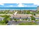 Aerial view of condo community near beach with tennis courts at 4407 Sea Mist Ct # 267, New Smyrna Beach, FL 32169