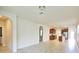 Spacious living room with tile flooring and open floorplan at 16253 Pebble Bluff Loop, Winter Garden, FL 34787