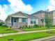Charming one-story home with stone accents and landscaped yard at 16253 Pebble Bluff Loop, Winter Garden, FL 34787