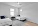 Bedroom with two twin beds and ceiling fan at 7540 Estuary Lake Loop, Celebration, FL 34747