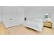Bedroom with double doors and wood floors at 7540 Estuary Lake Loop, Celebration, FL 34747