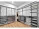 Large walk-in closet with ample shelving and drawer storage at 7540 Estuary Lake Loop, Celebration, FL 34747