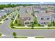 Aerial view of a house in a residential neighborhood at 7540 Estuary Lake Loop, Celebration, FL 34747