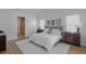 Main bedroom with a plush bed, ensuite bathroom access, and ample natural light at 7540 Estuary Lake Loop, Celebration, FL 34747