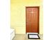 Townhome building's entrance with a brown door at 837 Grand Regency Pt # 207, Altamonte Springs, FL 32714