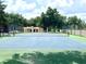 Well-maintained tennis court with green surroundings at 837 Grand Regency Pt # 207, Altamonte Springs, FL 32714