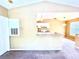 Open kitchen with white cabinets and a breakfast bar at 837 Grand Regency Pt # 207, Altamonte Springs, FL 32714
