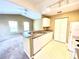 Modern kitchen with dishwasher and breakfast bar at 837 Grand Regency Pt # 207, Altamonte Springs, FL 32714