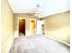 Large bedroom with ceiling fan and plush carpeting at 837 Grand Regency Pt # 207, Altamonte Springs, FL 32714