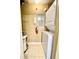 Compact laundry room with stacked washer and dryer at 837 Grand Regency Pt # 207, Altamonte Springs, FL 32714