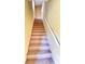 Carpeted staircase with a white railing at 837 Grand Regency Pt # 207, Altamonte Springs, FL 32714