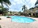 Inviting community pool with ample deck space for lounging at 837 Grand Regency Pt # 207, Altamonte Springs, FL 32714