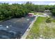 Aerial view of a garden area with a shed and greenhouse at 424 E Welch Rd, Apopka, FL 32712