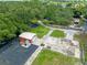 Aerial view showing a home with a large backyard, shed and garden at 424 E Welch Rd, Apopka, FL 32712