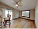 Dining area with wood flooring and sliding glass door to patio at 424 E Welch Rd, Apopka, FL 32712