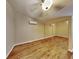 Light and airy bedroom, featuring mirrored closet at 424 E Welch Rd, Apopka, FL 32712