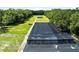Aerial view of property highlighting covered growing area at 424 E Welch Rd, Apopka, FL 32712