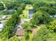 Aerial view of property, showing homes and outbuildings at 424 E Welch Rd, Apopka, FL 32712