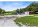 Property with detached shed and additional outbuildings at 424 E Welch Rd, Apopka, FL 32712