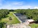 Property overview, showing various structures and landscape at 424 E Welch Rd, Apopka, FL 32712