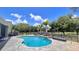 Relaxing kidney-shaped pool with stamped concrete decking at 3060 Rambler Ave, Saint Cloud, FL 34772