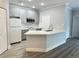 Modern kitchen featuring gray cabinets and quartz countertops at 3561 Conroy Rd # 227, Orlando, FL 32839