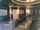 Community theater room with plush seating and a large screen at 3561 Conroy Rd # 227, Orlando, FL 32839