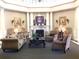 Elegant lobby with comfortable seating, fireplace, and high ceilings at 3561 Conroy Rd # 227, Orlando, FL 32839
