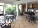 Community outdoor kitchen with screened patio and seating at 3561 Conroy Rd # 227, Orlando, FL 32839