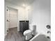 Bathroom with a tub, toilet and modern vanity at 3229 Energy Dr, Kissimmee, FL 34747