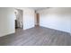 Bedroom with private bathroom and wood-look floors at 3229 Energy Dr, Kissimmee, FL 34747