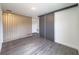 Spacious bonus room with wood-look floors and built-in storage at 3229 Energy Dr, Kissimmee, FL 34747