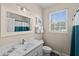 Bathroom with white vanity, toilet, and shower/tub combo at 8100 Princess Palm Ln # 201, Kissimmee, FL 34747
