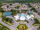 Community features tennis courts, basketball court and central pool area at 8100 Princess Palm Ln # 201, Kissimmee, FL 34747
