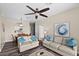 Open living space showcasing a neutral color palette and plenty of natural light at 8100 Princess Palm Ln # 201, Kissimmee, FL 34747