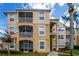 Building exterior showcasing residential units at 8100 Princess Palm Ln # 201, Kissimmee, FL 34747