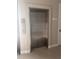 Modern stainless steel elevator in a well-lit building at 7740 Sandy Ridge Dr # 213, Reunion, FL 34747
