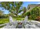 Relaxing backyard with fire pit and comfortable seating area at 2234 Via Luna, Winter Park, FL 32789