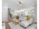 Open living space with white sectional sofa and kitchen views at 2234 Via Luna, Winter Park, FL 32789