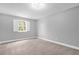 Empty bedroom with carpeted floors and a window with shutters at 2234 Via Luna, Winter Park, FL 32789