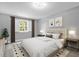 Calm bedroom with a white comforter and black and white rug at 2234 Via Luna, Winter Park, FL 32789