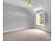 Spacious bedroom with plush carpeting and a large window at 2234 Via Luna, Winter Park, FL 32789