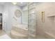 Elegant bathroom with soaking tub, glass block shower, and updated fixtures at 2234 Via Luna, Winter Park, FL 32789