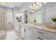 Spa-like bathroom with double vanity and a large mirror at 2234 Via Luna, Winter Park, FL 32789