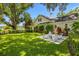 Spacious backyard with fire pit and ample lawn space at 2234 Via Luna, Winter Park, FL 32789